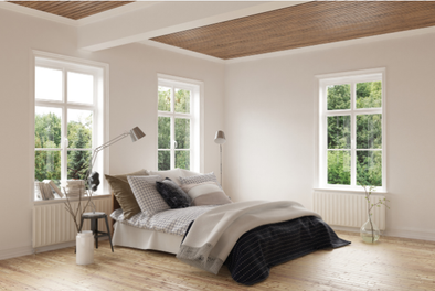 bedroom with white window grilles