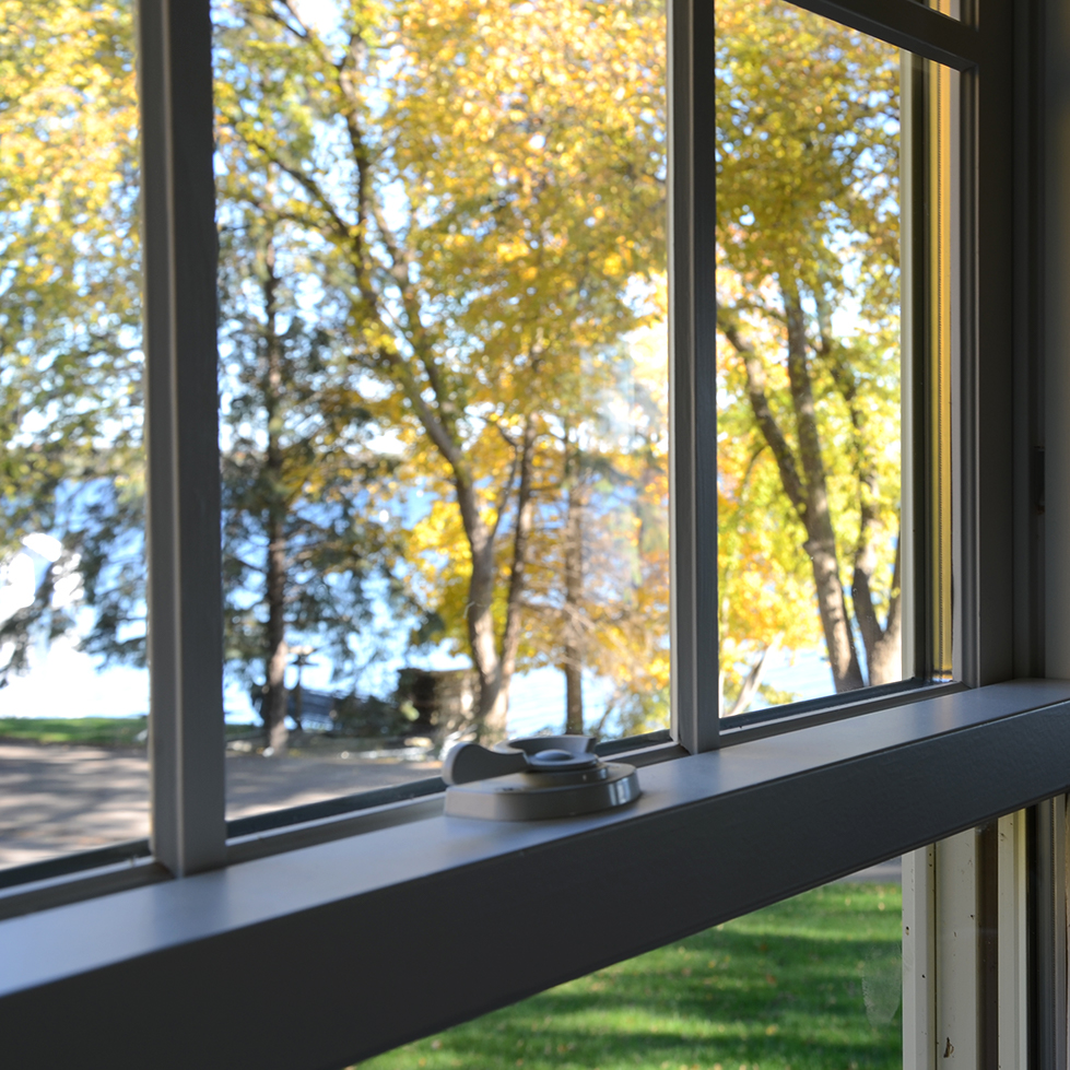View through a Window showing Premium Colonial Window Grille Inserts