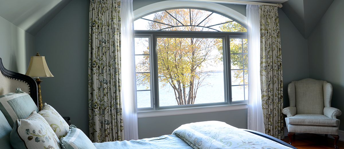 Bedroom Window with Colonial and Curved top window grilles.