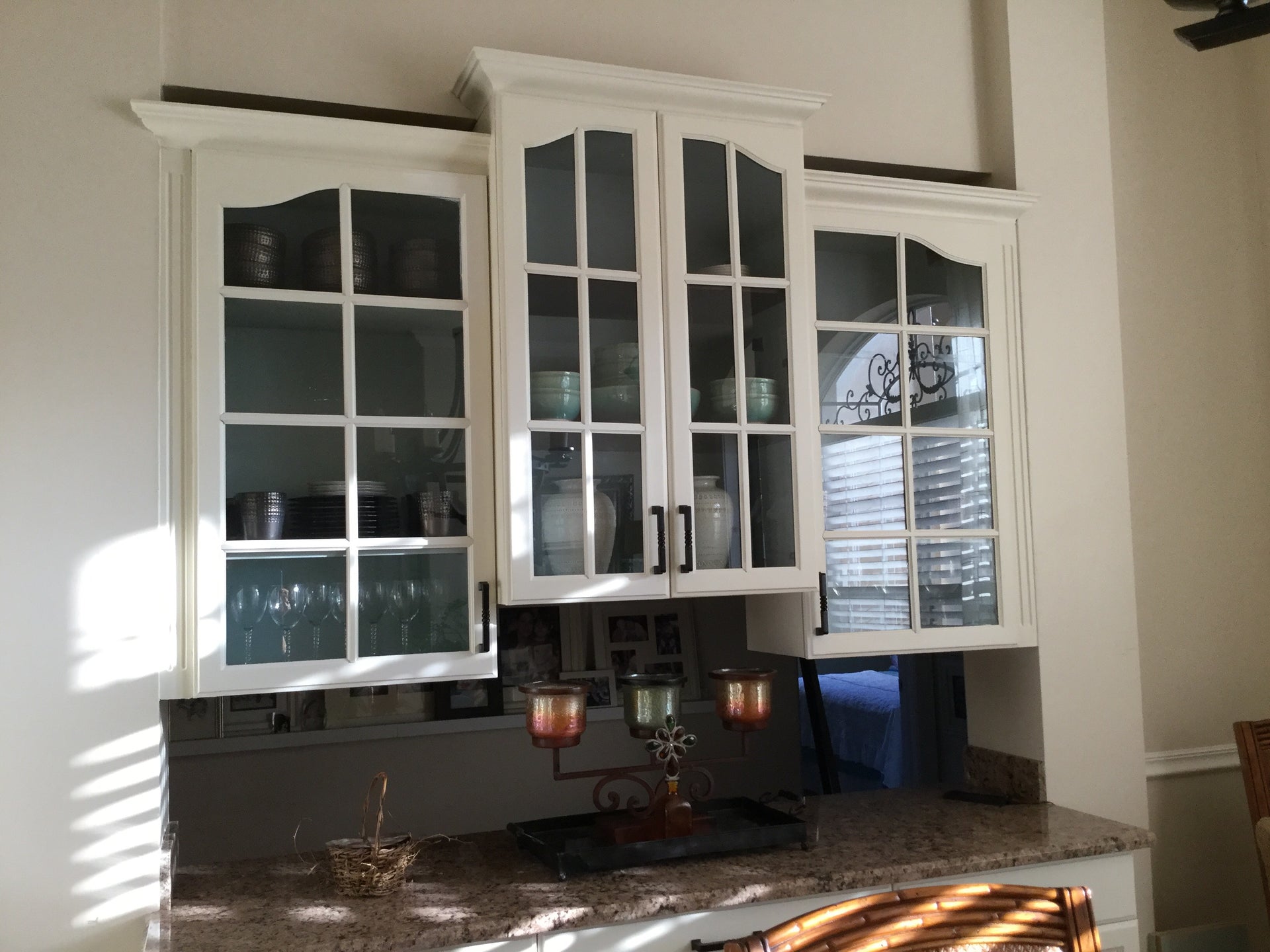 Glass cabinets with custom window grilles installed