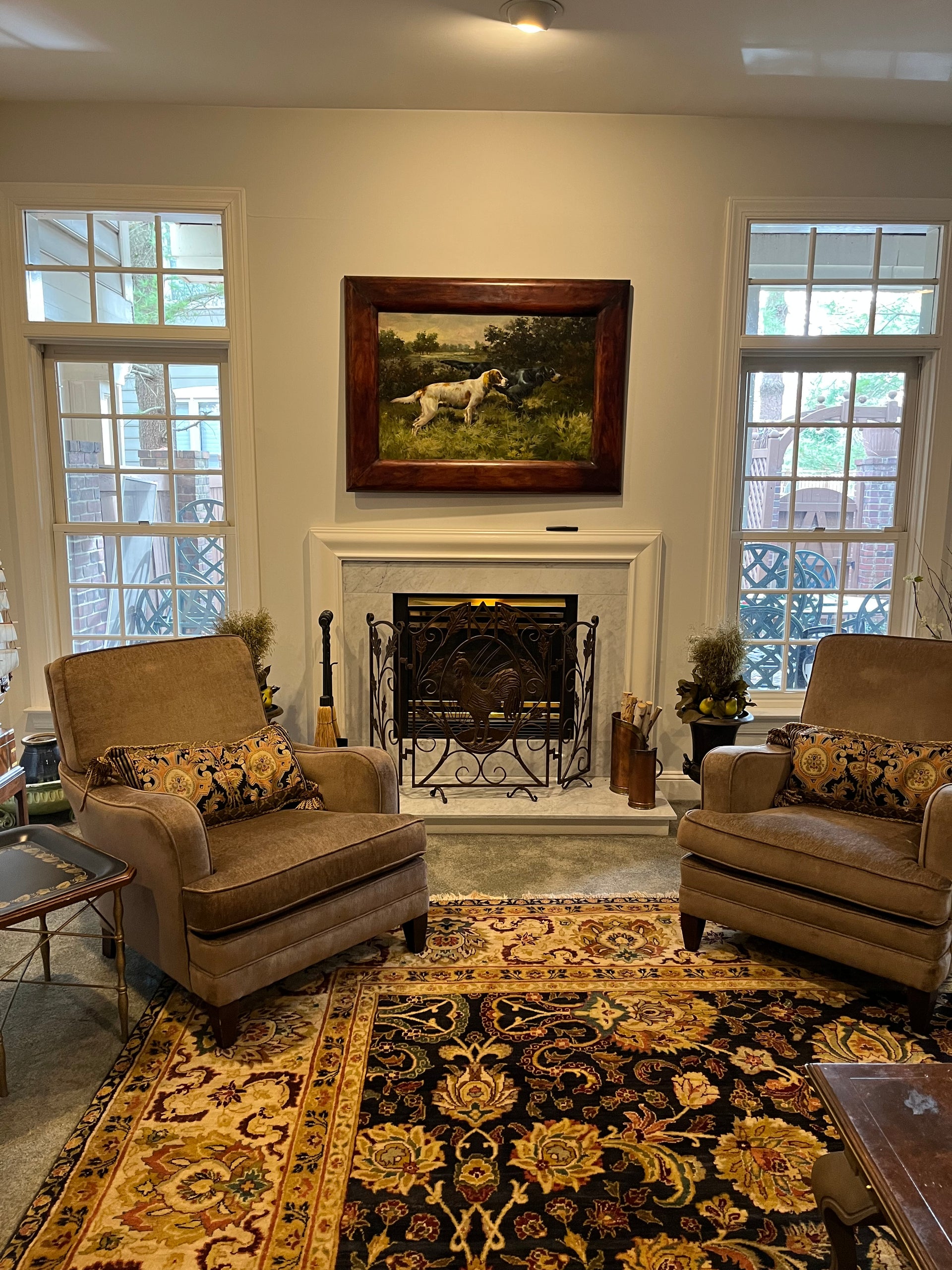 Living room showing windows will grilles installed.