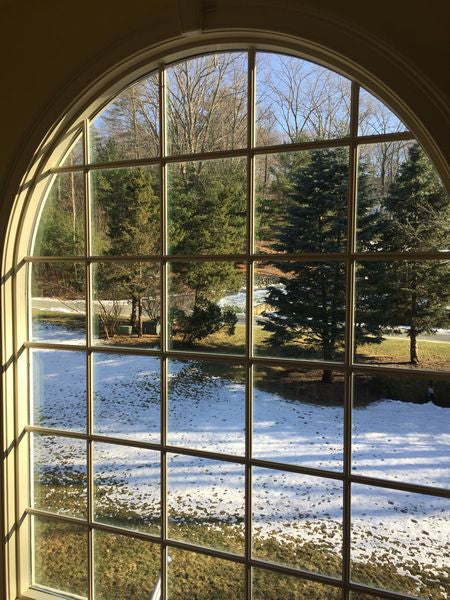 Colonial Grille installed in a radius top window